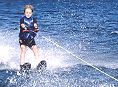Squirt boat pulling skier